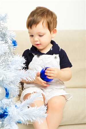 simsearch:400-07088886,k - beautiful happy small kid decorate christmas tree Stock Photo - Budget Royalty-Free & Subscription, Code: 400-06640401