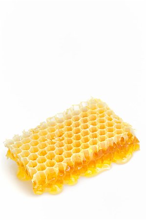 Honeycomb isolated on white Photographie de stock - Aubaine LD & Abonnement, Code: 400-06640622