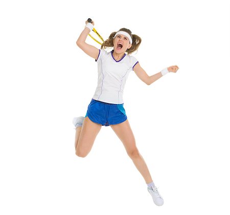 Fierce tennis player jump to hit ball Stock Photo - Budget Royalty-Free & Subscription, Code: 400-06640988