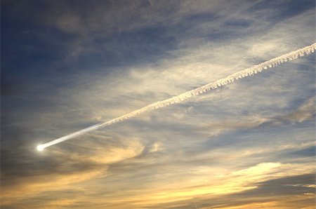 flying smoky meteor on background of sky Stock Photo - Budget Royalty-Free & Subscription, Code: 400-06641436