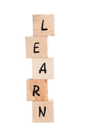 simsearch:400-08998245,k - Learn spelled out with wooden blocks. White background. Foto de stock - Super Valor sin royalties y Suscripción, Código: 400-06641983