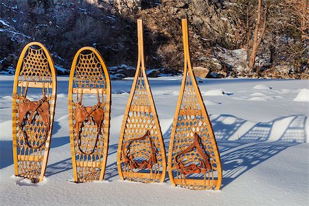 vintage Bear Paw and Huron snowshoes cast shadow in snow, Poudre River Canyon near Fort Collins, Colorado Photographie de stock - Aubaine LD & Abonnement, Code: 400-06642035