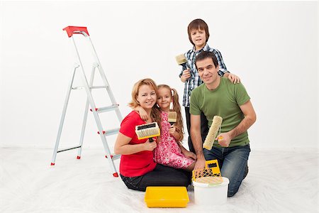 Happy people family preparing to paint their home Stock Photo - Budget Royalty-Free & Subscription, Code: 400-06642089