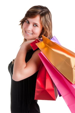 simsearch:400-06092781,k - Woman Carrying Shopping Bags isolated in a white background Photographie de stock - Aubaine LD & Abonnement, Code: 400-06642216