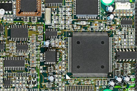 simsearch:400-05269277,k - Closeup of electronic circuit board PCB with CPU processor and other components Stockbilder - Microstock & Abonnement, Bildnummer: 400-06642551