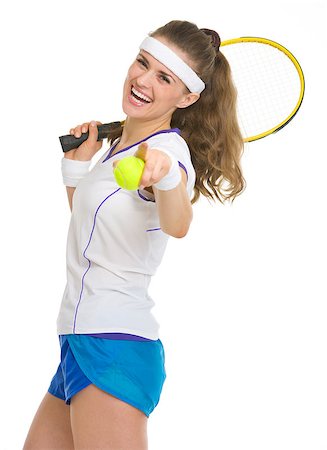 Happy tennis player with racket and ball pointing in camera Photographie de stock - Aubaine LD & Abonnement, Code: 400-06642756