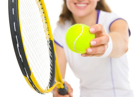 Closeup on racket and ball in hand of tennis player ready to serve Stock Photo - Budget Royalty-Free & Subscription, Code: 400-06642763