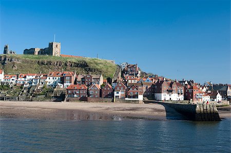 english ports - View of the waterfront and houses in Whitby in North Yorkshire with Tate hill in the background Stock Photo - Budget Royalty-Free & Subscription, Code: 400-06643233