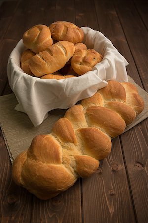 Baked rustic bread on the wood table Stock Photo - Budget Royalty-Free & Subscription, Code: 400-06643705