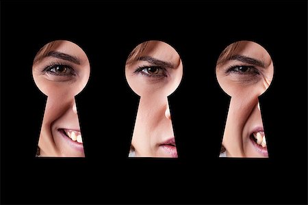 Girl with different emotions looks in a keyhole Stock Photo - Budget Royalty-Free & Subscription, Code: 400-06643959