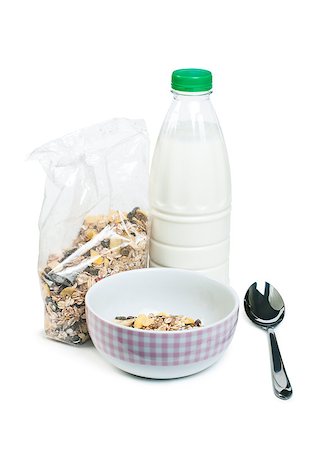 simsearch:400-09238081,k - Muesli breakfast in package.Bottle milk and spoon white isolated Photographie de stock - Aubaine LD & Abonnement, Code: 400-06643988