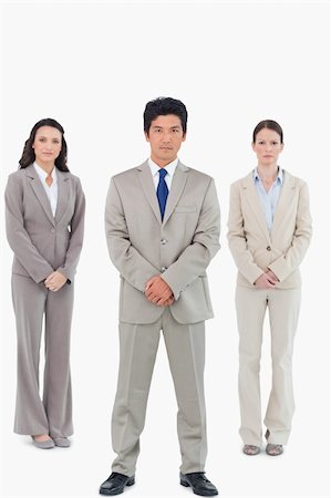 simsearch:6109-06002735,k - Confident looking salesteam against a white background Stock Photo - Budget Royalty-Free & Subscription, Code: 400-06685621