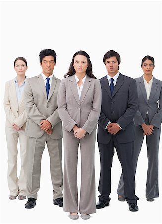 simsearch:6109-06002735,k - Tradeswoman standing with her team against a white background Stock Photo - Budget Royalty-Free & Subscription, Code: 400-06686498