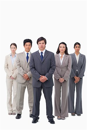 simsearch:6109-06002735,k - Businessman standing with his team against a white background Stock Photo - Budget Royalty-Free & Subscription, Code: 400-06686492