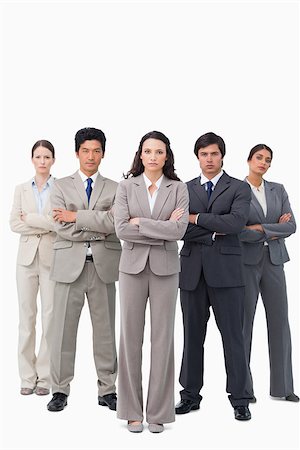 simsearch:400-07186359,k - Serious businessteam standing with arms folded against a white background Stock Photo - Budget Royalty-Free & Subscription, Code: 400-06686500