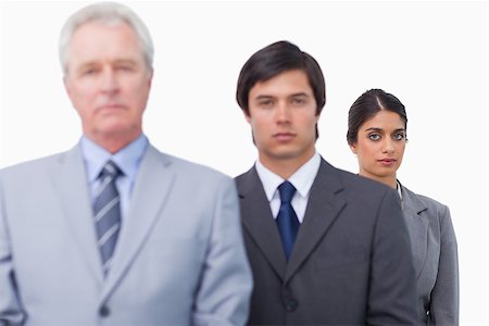 simsearch:6109-06002735,k - Mature businessman with his employees against a white background Stock Photo - Budget Royalty-Free & Subscription, Code: 400-06686525