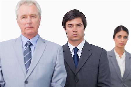 simsearch:6109-06002735,k - Mature salesman with his employees against a white background Stock Photo - Budget Royalty-Free & Subscription, Code: 400-06686526