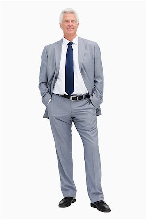 Portrait of a man in a suit with hands in the pockets against white babckground Stock Photo - Budget Royalty-Free & Subscription, Code: 400-06687068