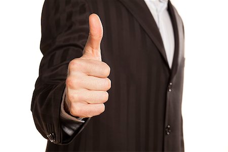 simsearch:400-05946445,k - close up of strong male hand of businessman showing thumbs up on white background Foto de stock - Super Valor sin royalties y Suscripción, Código: 400-06687575