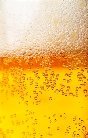 simsearch:695-05774838,k - Orange beer and white froth background. Closeup view. Stock Photo - Budget Royalty-Free & Subscription, Code: 400-06687690