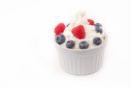 simsearch:400-08110674,k - Jar of berries and whipped cream against white background Stockbilder - Microstock & Abonnement, Bildnummer: 400-06689146