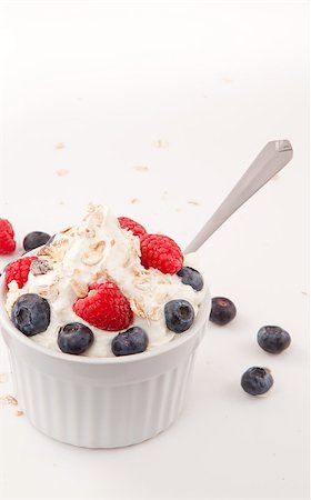 simsearch:400-08110674,k - Healthy dessert with berries against white background Stockbilder - Microstock & Abonnement, Bildnummer: 400-06689155