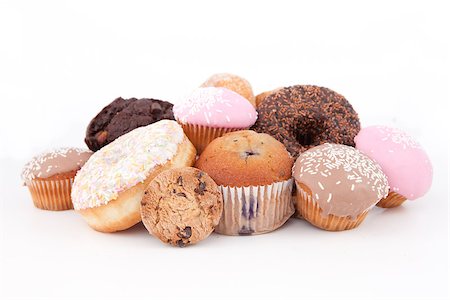 doughnut background - Cakes laid out together against a white background Stock Photo - Budget Royalty-Free & Subscription, Code: 400-06689531
