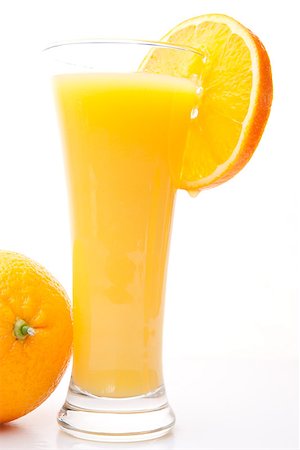 simsearch:400-06689686,k - Glass of orange juice near a orange Foto de stock - Super Valor sin royalties y Suscripción, Código: 400-06689614