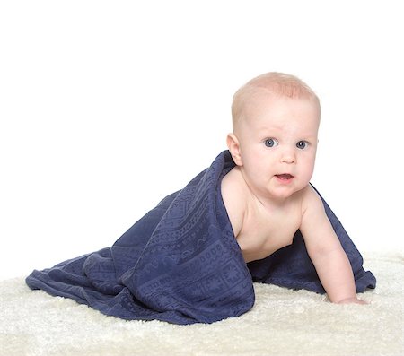 simsearch:614-03648659,k - Adorable happy baby in colorful towel on white background Fotografie stock - Microstock e Abbonamento, Codice: 400-06694141
