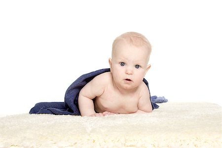 simsearch:614-03648659,k - Adorable happy baby in colorful towel on white background isolated Fotografie stock - Microstock e Abbonamento, Codice: 400-06694143