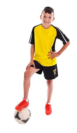 simsearch:400-04325504,k - Teenage boy with soccer ball over white background Fotografie stock - Microstock e Abbonamento, Codice: 400-06694198