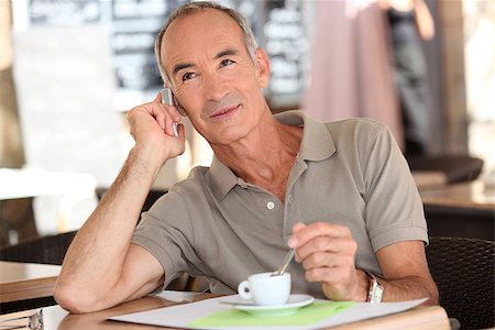 Man on the phone having coffee Stock Photo - Budget Royalty-Free & Subscription, Code: 400-06694273