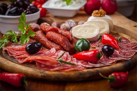 Catering platter with antipasti and fingerfood Photographie de stock - Aubaine LD & Abonnement, Code: 400-06694626