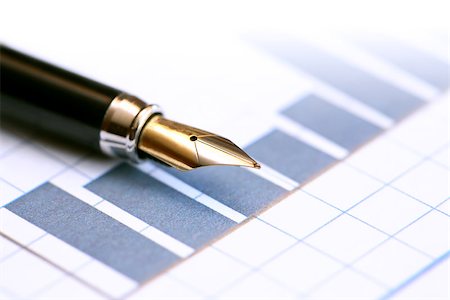 penna stilografica - Business concept. Closeup of fountain pen on paper background with business chart Fotografie stock - Microstock e Abbonamento, Codice: 400-06694738