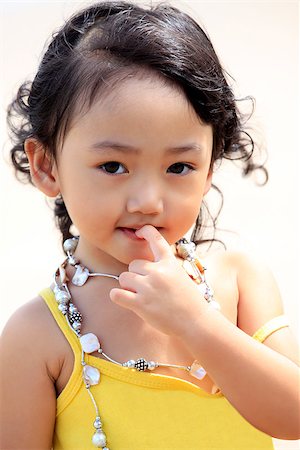 simsearch:400-06389659,k - Portrait of the beautiful small Asian girl. Indonesia. Java Stock Photo - Budget Royalty-Free & Subscription, Code: 400-06694763