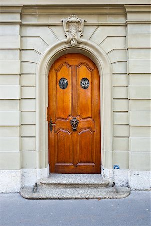 door lion - Solid Wooden Door in the Swiss City Stock Photo - Budget Royalty-Free & Subscription, Code: 400-06694798