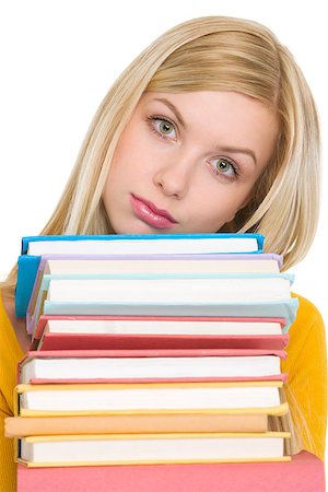 school girl holding pile of books - Frustrated student girl holding stack of books Stock Photo - Budget Royalty-Free & Subscription, Code: 400-06694908