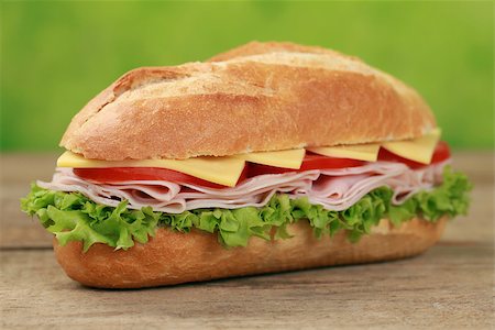 simsearch:400-06421213,k - Sub Sandwiches with ham, cheese, tomatoes and lettuce Foto de stock - Super Valor sin royalties y Suscripción, Código: 400-06695071