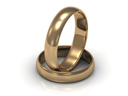 simsearch:400-05361582,k - 2 Gold wedding rings. Ring in the ring on a white background Stock Photo - Budget Royalty-Free & Subscription, Code: 400-06695134