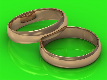 simsearch:400-06061555,k - 2 Gold wedding rings on a green background Photographie de stock - Aubaine LD & Abonnement, Code: 400-06695135