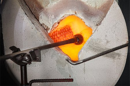 simsearch:400-06796868,k - Glass object held by rod baking in hot kiln Stock Photo - Budget Royalty-Free & Subscription, Code: 400-06696171