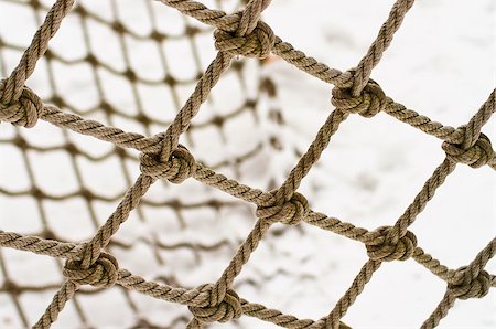 rope texture - The nodes of the old woven mesh Photographie de stock - Aubaine LD & Abonnement, Code: 400-06696374