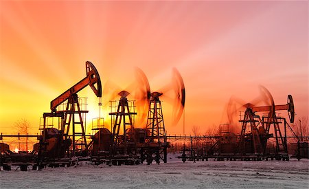 oil pumps at sunset sky background Stock Photo - Budget Royalty-Free & Subscription, Code: 400-06696445