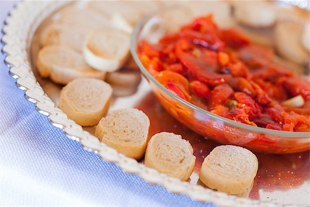 sour dough bread - Sourdough Slices and Peppers on Serving Tray. Stock Photo - Budget Royalty-Free & Subscription, Code: 400-06696490