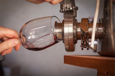 Vintner Pours a Taste of Wine from Barrel into Glass. Stock Photo - Budget Royalty-Free & Subscription, Code: 400-06696493