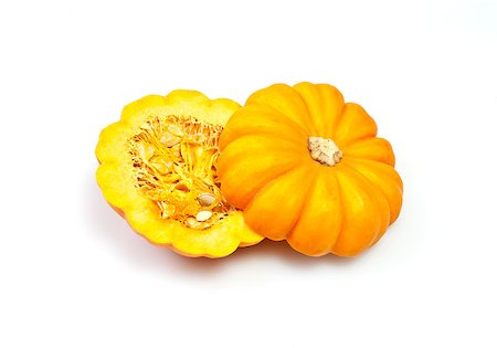 semilla de calabaza - Cuts of miniature pumpkin called Gold Dust Foto de stock - Super Valor sin royalties y Suscripción, Código: 400-06696524