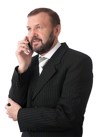 simsearch:400-07820348,k - cheerful senior business man talking on a cell phone. Isolated on white Photographie de stock - Aubaine LD & Abonnement, Code: 400-06696646