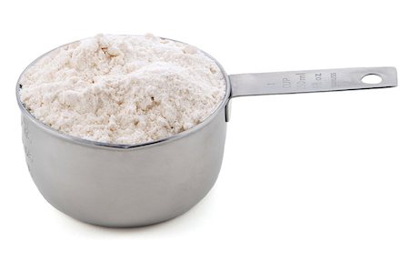 simsearch:400-06742851,k - Plain / all purpose flour presented in an American metal cup measure, isolated on a white background Foto de stock - Super Valor sin royalties y Suscripción, Código: 400-06697297