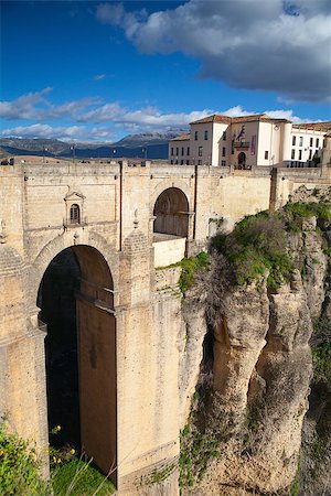 simsearch:400-07209028,k - View of buildings in new town from other side of the 18th century bridge over the 300 ft Tajo Gorge in Ronda Spain Stock Photo - Budget Royalty-Free & Subscription, Code: 400-06697314