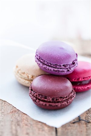 simsearch:400-06564979,k - Closeup of four different flavoured macaroons on wooden table Stock Photo - Budget Royalty-Free & Subscription, Code: 400-06697367